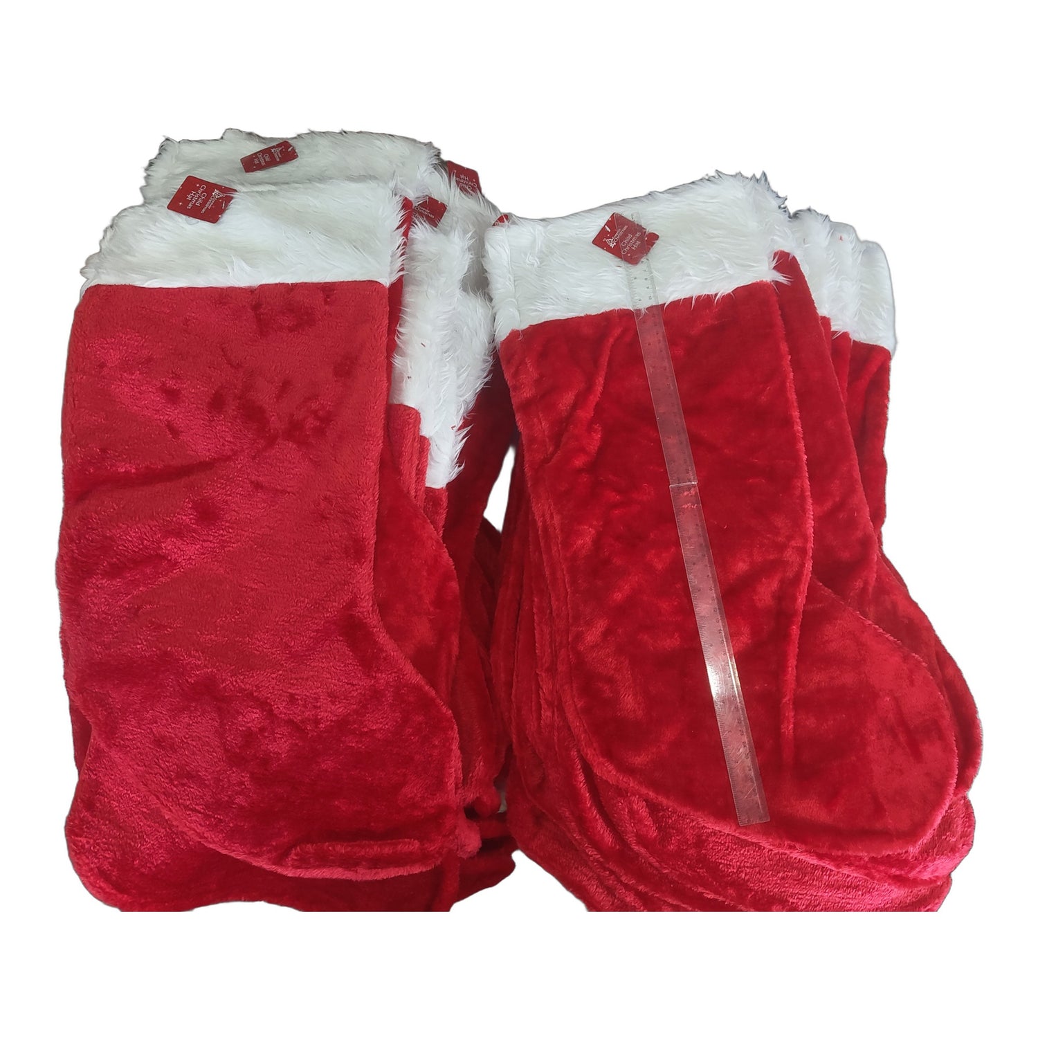 Jumbo red plush Christmas stocking with white faux fur cuff, sold in bulk packs