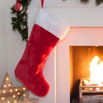 Jumbo red plush Christmas stocking with white faux fur cuff, sold in bulk packs